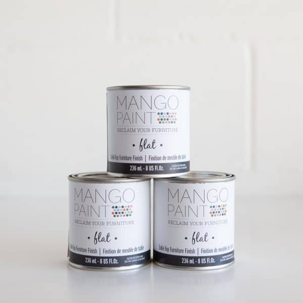 1/2 pint cans of Mango Paint product Table Top Finish in flat