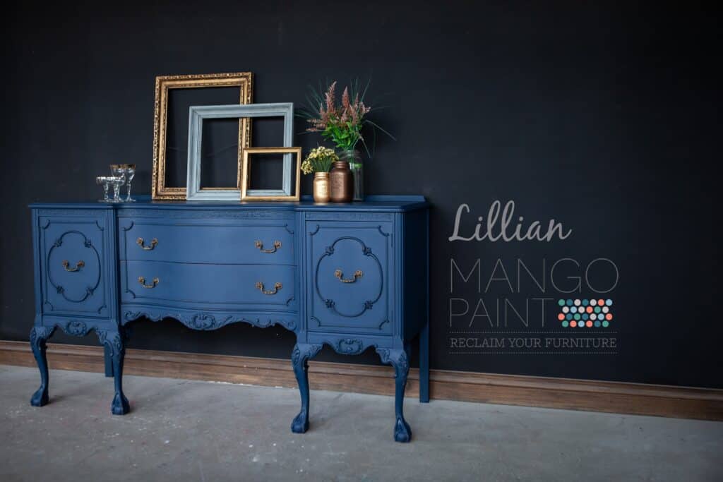 ornate dining buffet painted in Lillian dark blue Mango Paint with natural beeswax applied, angle view
