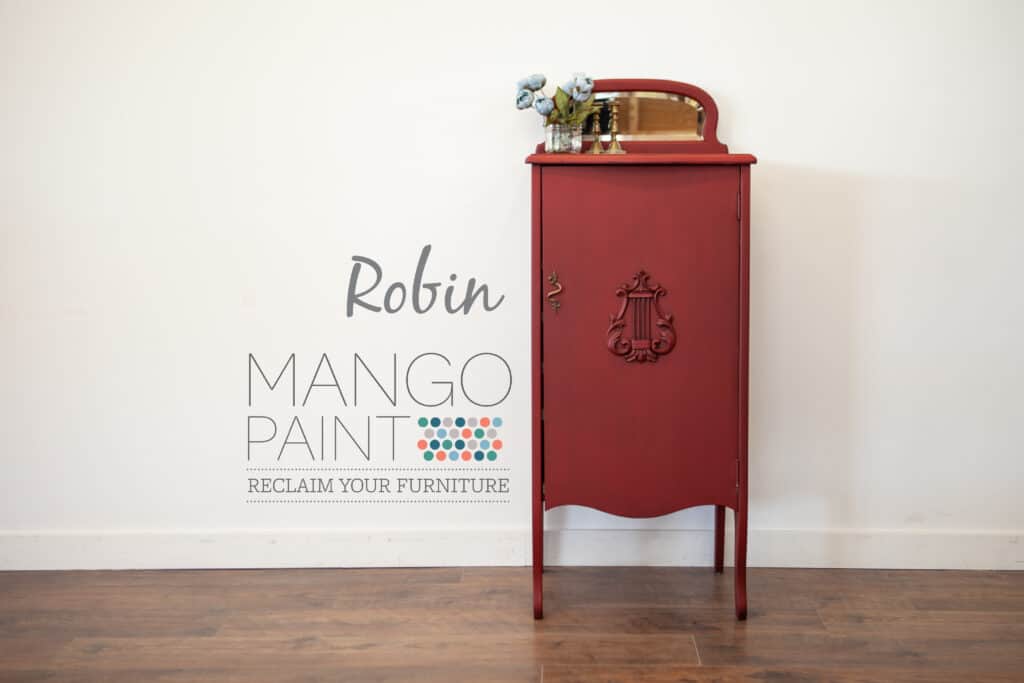Music cabinet painted in Robin red Mango Paint with antique beeswax applied